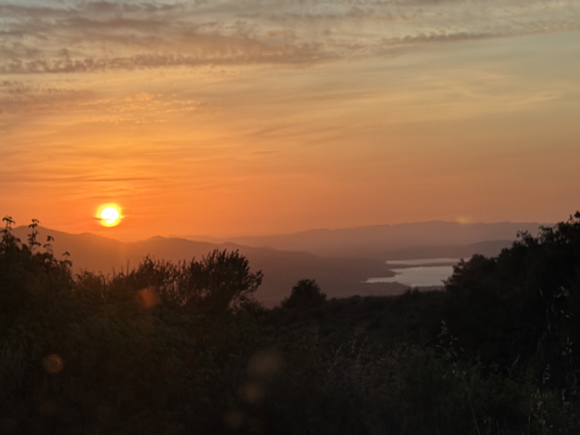 Sunset over the valley and reservoir