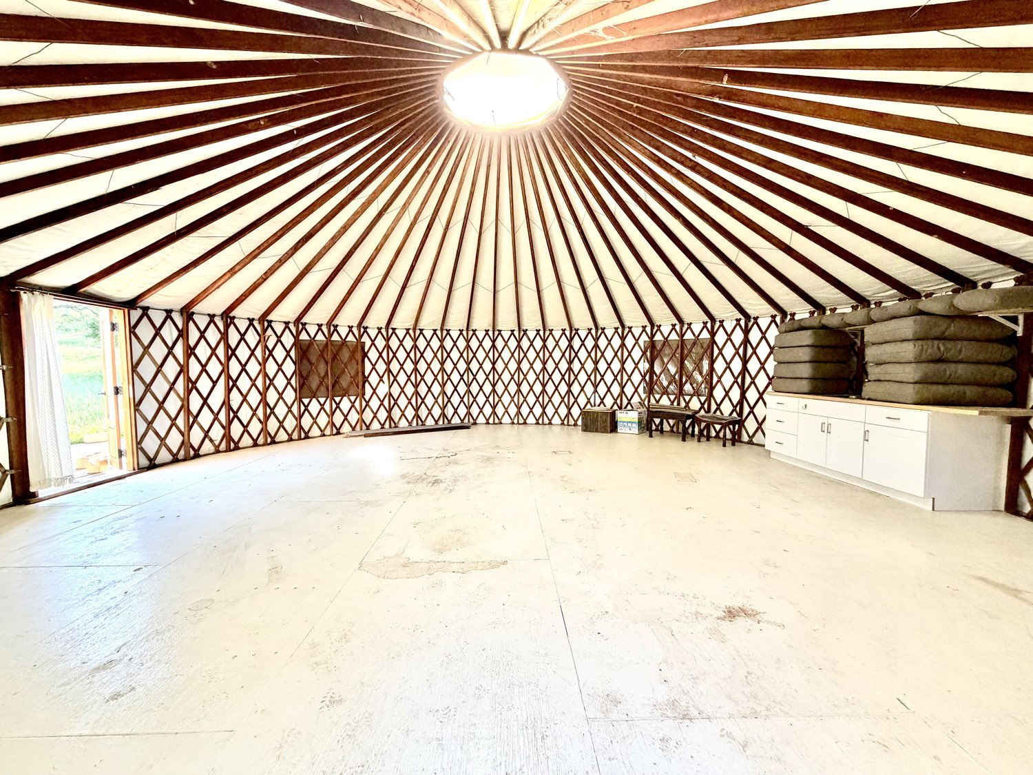 The interior of the yurt with its oculus skylight